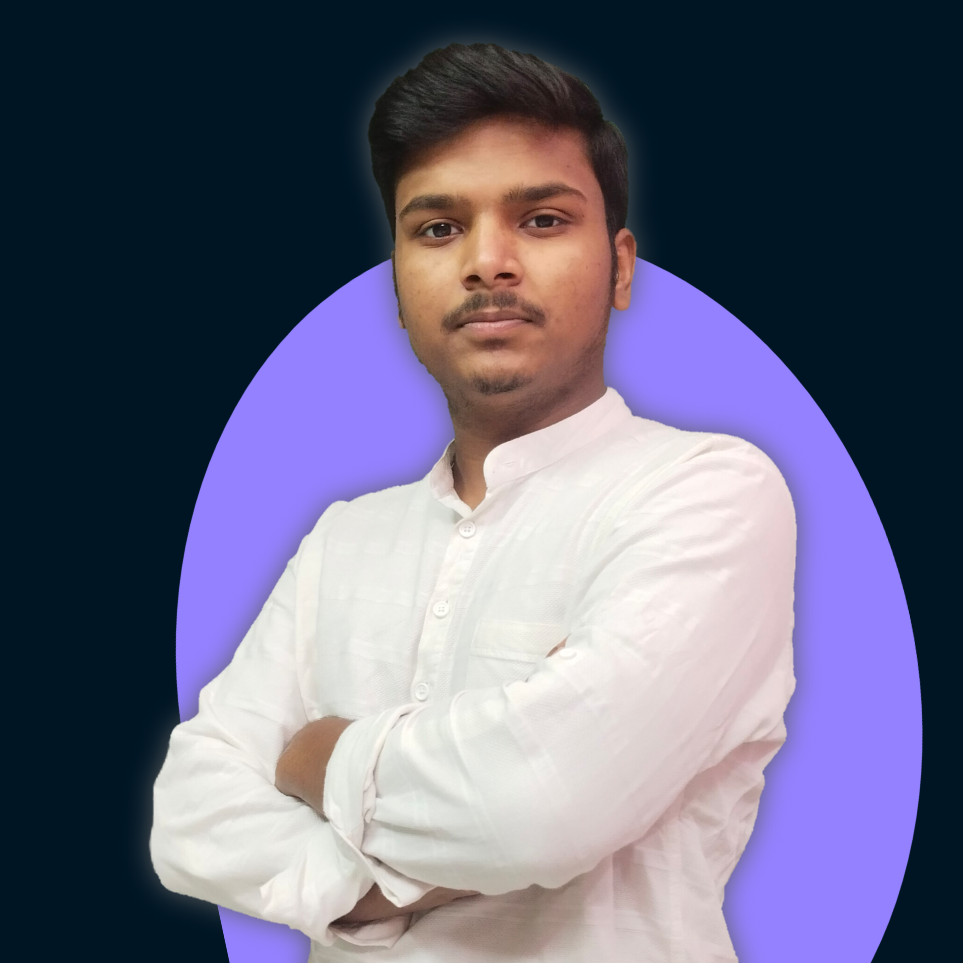 Portrait of a confident young man wearing white traditional kurta with arms crossed